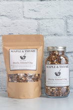 Load image into Gallery viewer, bag and jar of mocha almond chip granola